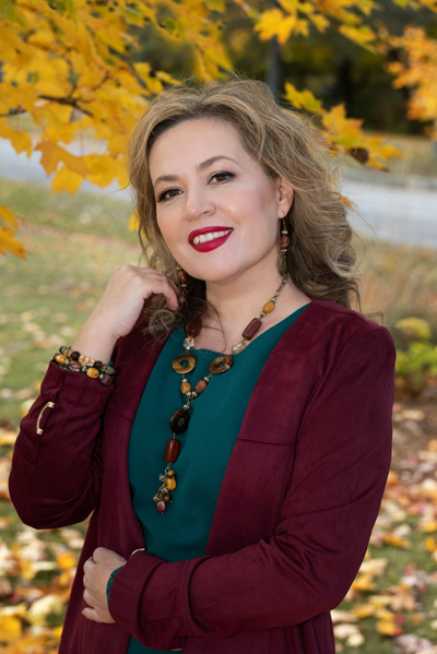 Golden and Burgundy Dream jewellery set shown on a model